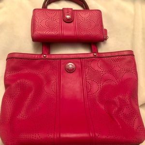 Coach leather handbag and matching wallet.